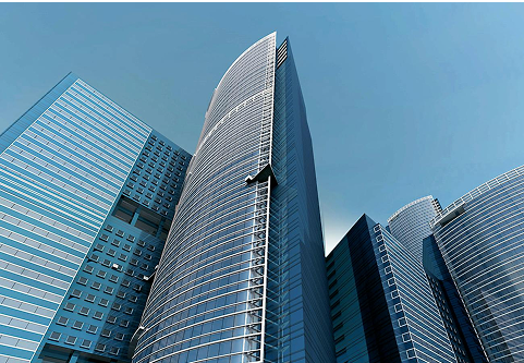 Skyscrapers viewed from the ground against a clear blue sky